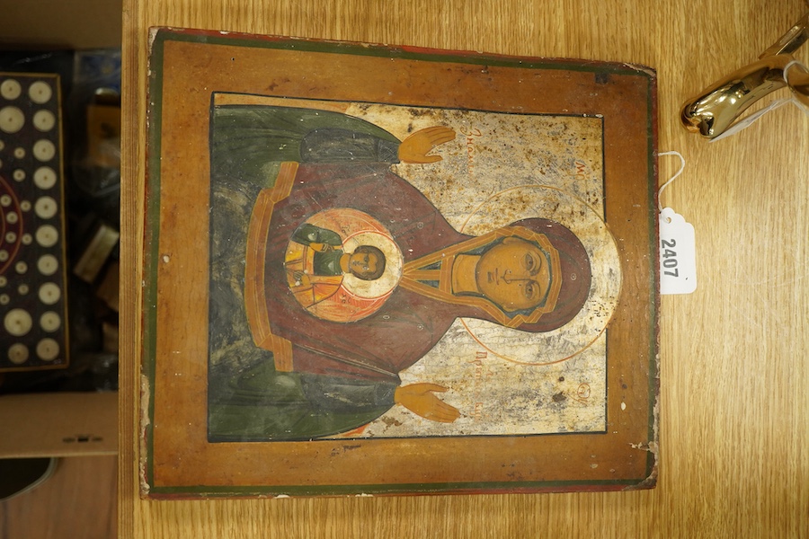 A 19th century Greek painted wood icon of Madonna and child, 31cm high